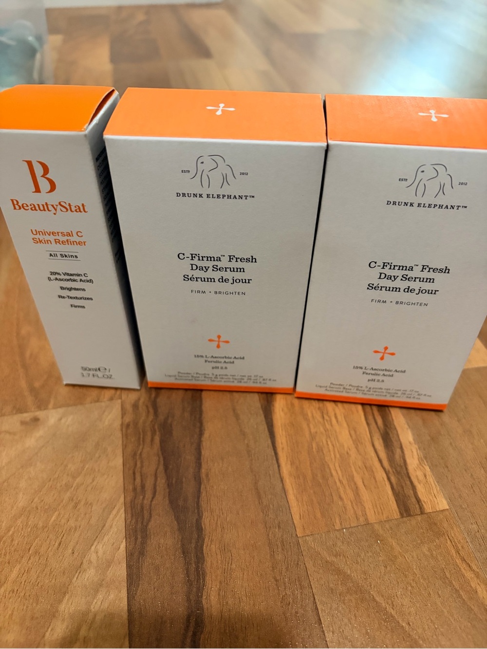 Drunk Elephant C-Firma Fresh Day Serum in Orange and White Packaging